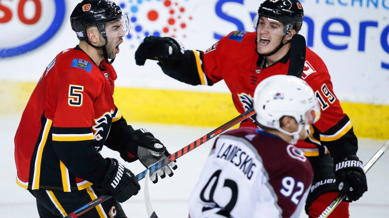 Flames score 5 straight in 3rd to rally past Avalanche 6-5